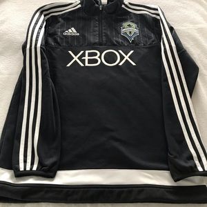 Seattle Sounders top, color black size M in perfect condition